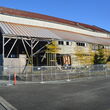 Image of Moore-Clark building with fencing around it.