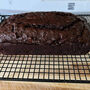 Loaf of chocolate banana bread on cooling rack