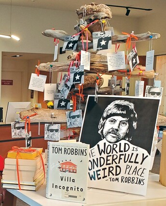 A display of Tom Robbins' book covers