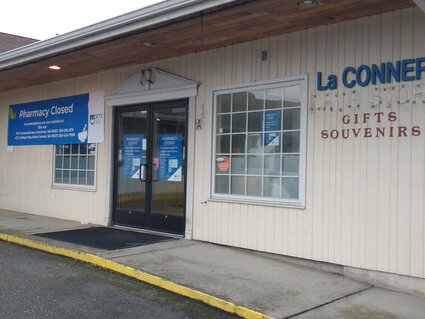 Image of La Conner Drug Store with missing Drug Store sign.